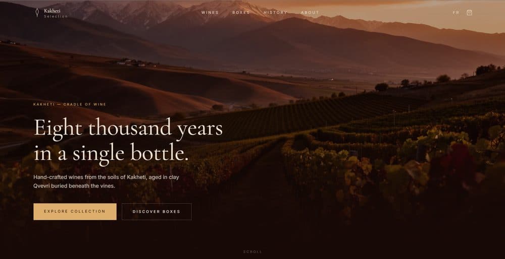 Kakheti Selection homepage hero: 'Eight thousand years in a single bottle' over a sunset vineyard photo, with Explore Collection and Discover Boxes buttons